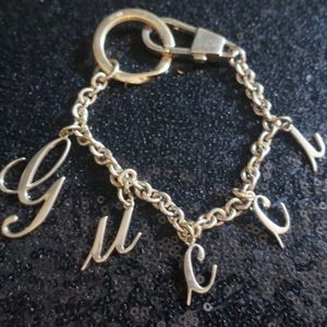 GUCCI rare gold bracelet style keychain.